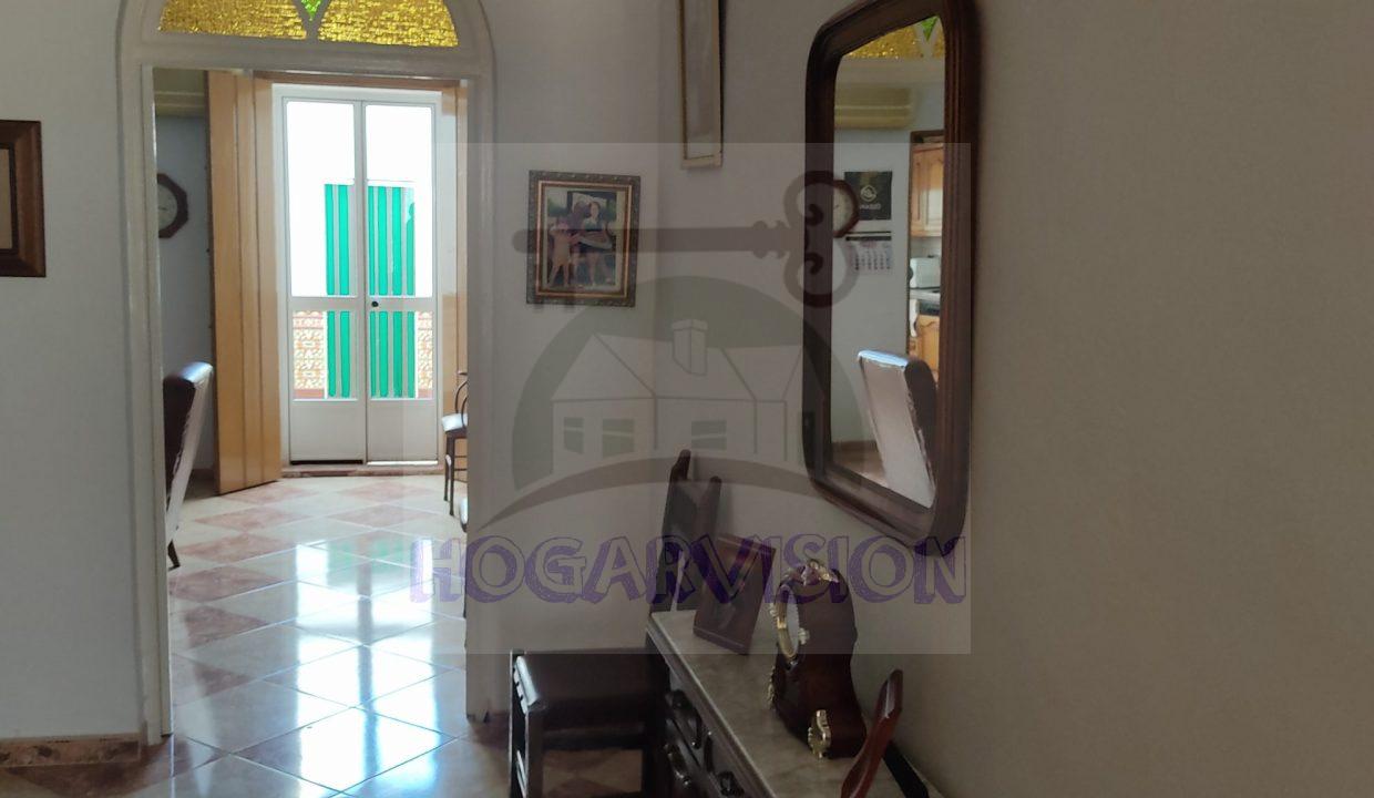 Recibidor de casa en calle Granada en La Puebla de Cazalla